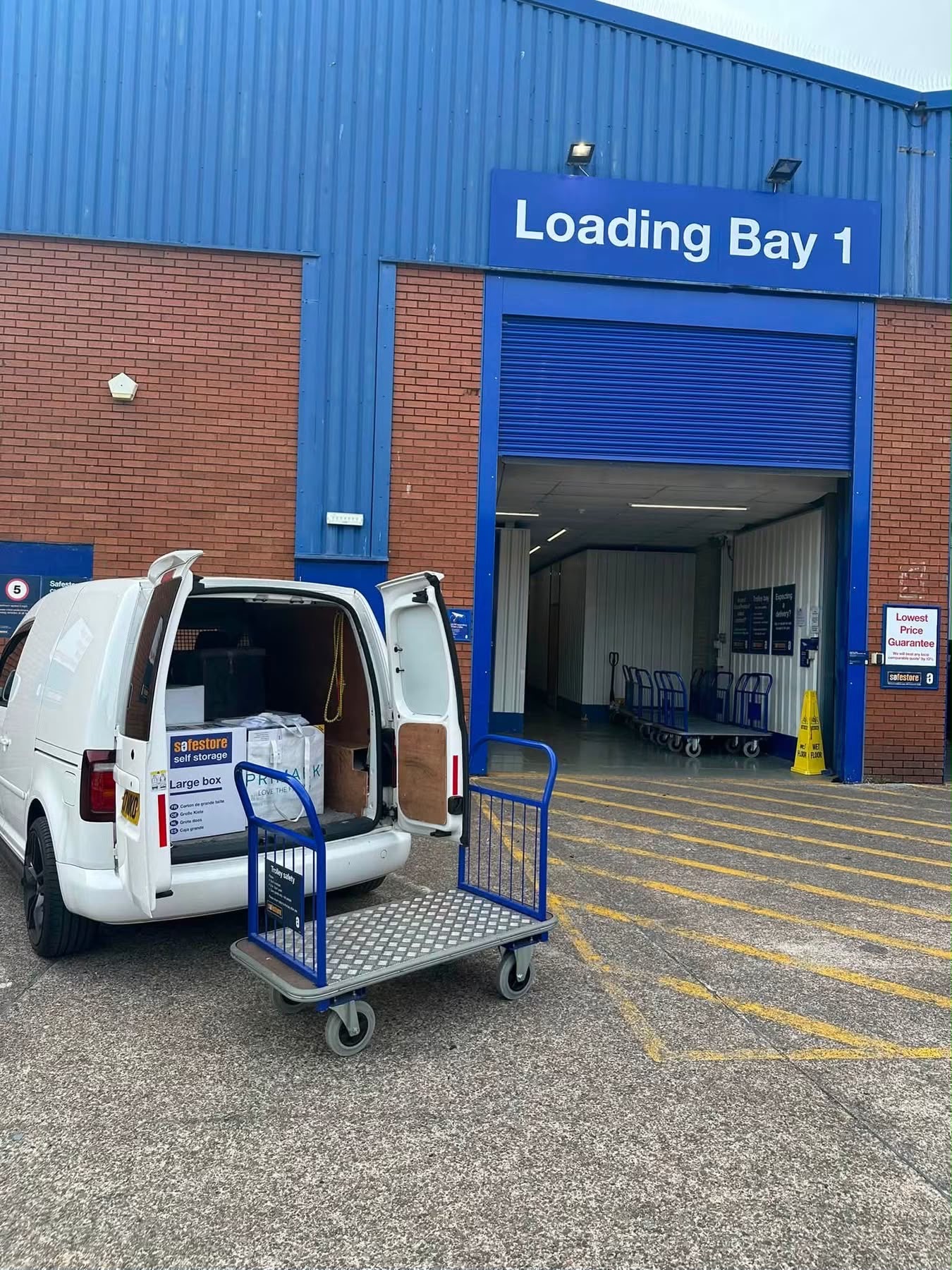 Collection at a self storage loading bay with trolley